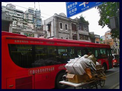 Old fashioned lorry bike and modern trolley bus, Zhongshan Road, Yuexiu district.